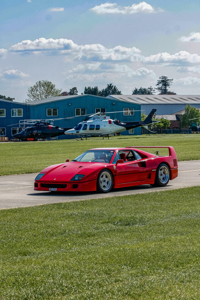 A Red Ferrari F40 Parked at an Air Strip