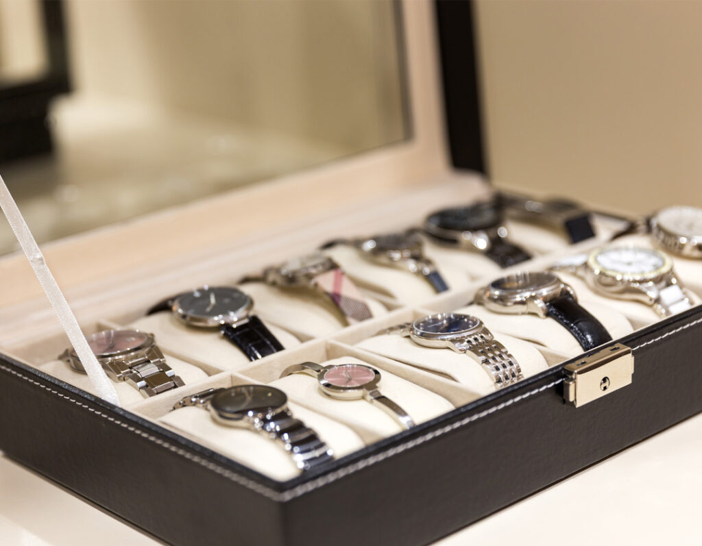 Collection of Rollex watches in a box