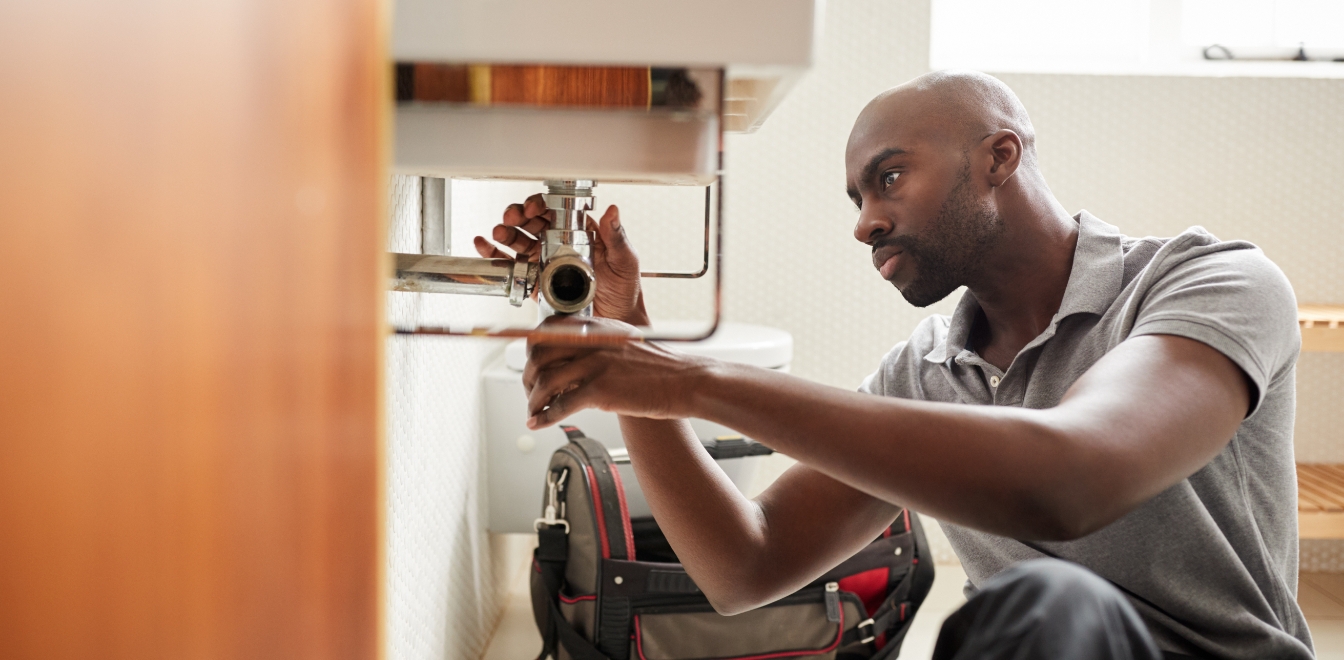 Elevate-business-insurance-plumber-working