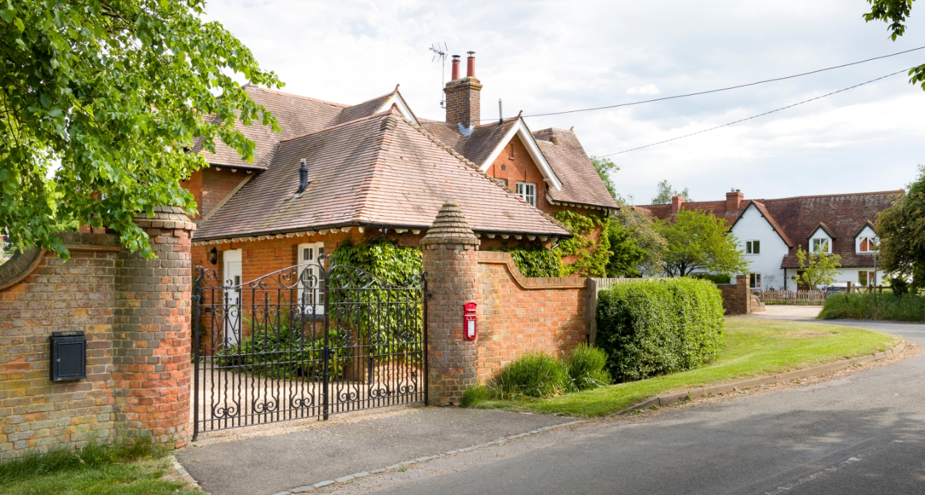 A luxury listed building with a gated entrance